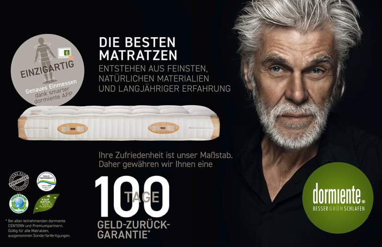 Grauhaariger Mann mit Bart und blauen augen schaut in die Kamera, Text: Die besten Matratzen entstehen aus feinsten, natürlichen Materialien und langjähriger Erfahrung. 100 Tage Geld zurück Garantie